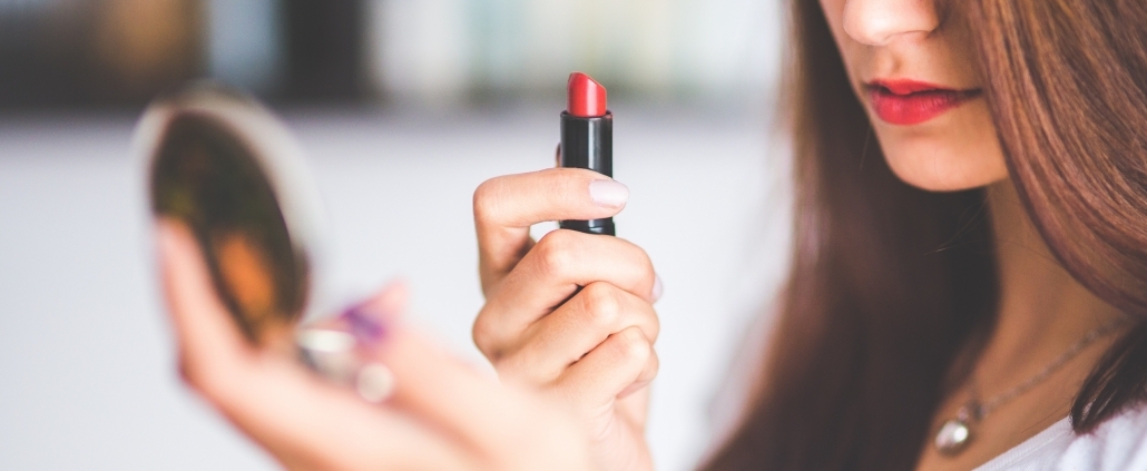 Beauty retail - woman doing make-up