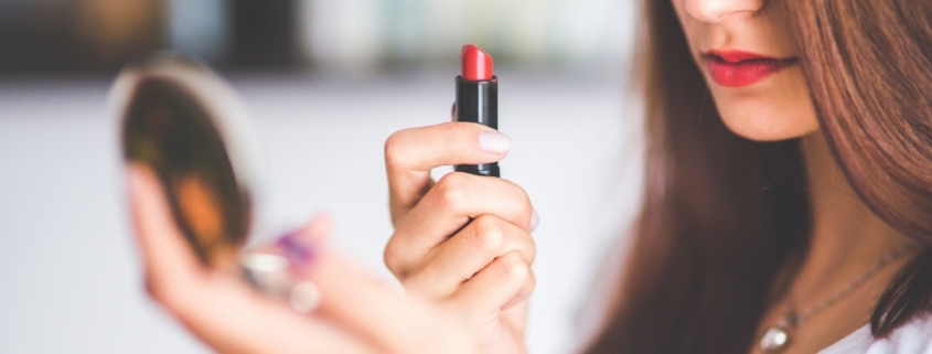 Beauty retail - woman doing make-up