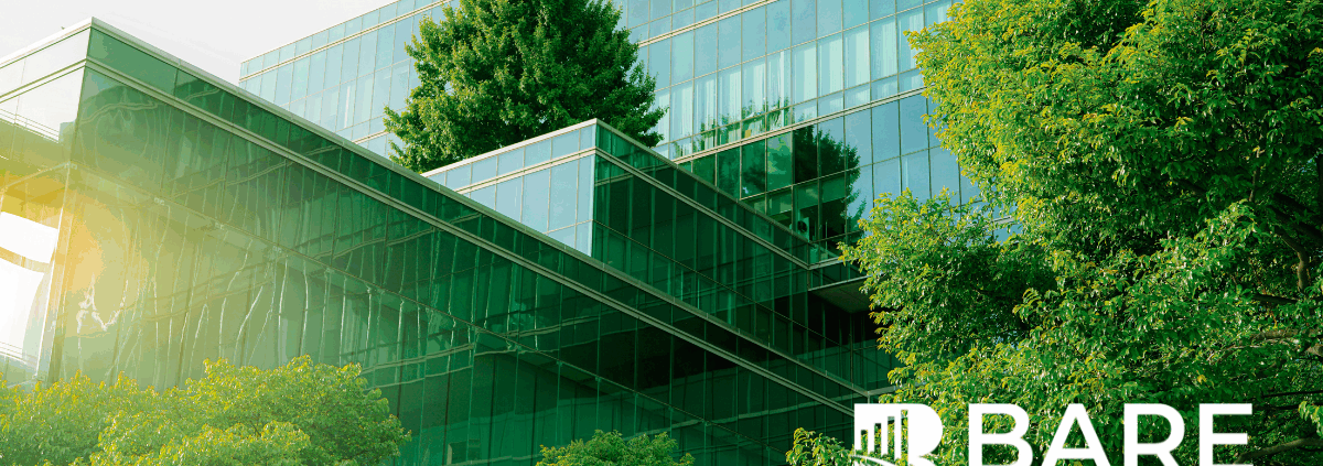 Eco-friendly corporate building with glass architecture and greenery, representing authentic ESG and sustainability efforts – BARE International
