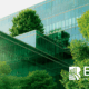 Eco-friendly corporate building with glass architecture and greenery, representing authentic ESG and sustainability efforts – BARE International