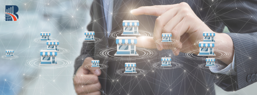 Businessman in a suit selecting a store icon among multiple connected shops – concept of business excellence, franchise management, and network growth.