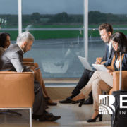Business Travelers Working in Airport Lounge – BARE International