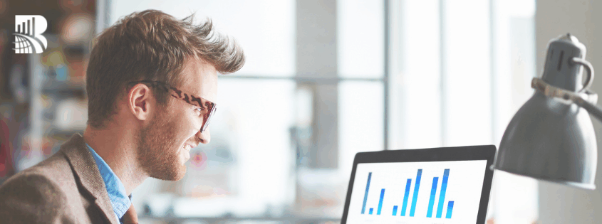 Professional reviewing customer satisfaction metrics on a laptop, representing mystery shopping insights and performance analysis.