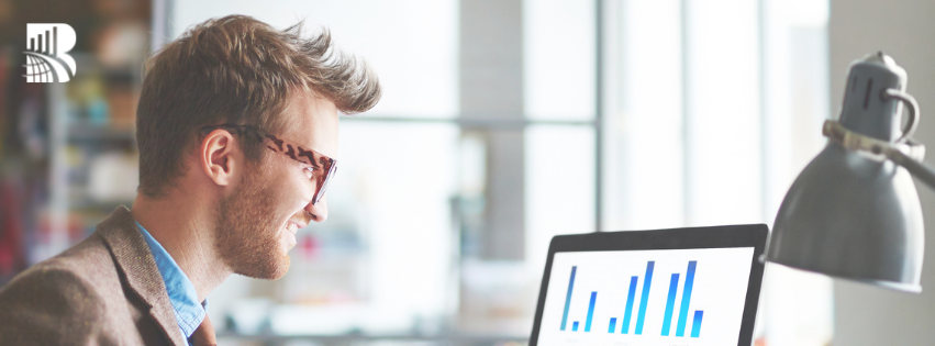 Professional reviewing customer satisfaction metrics on a laptop, representing mystery shopping insights and performance analysis.