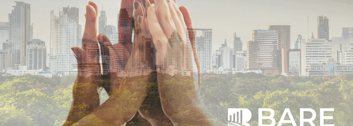 Hands coming together over a city skyline symbolizing ESG-driven customer experience, sustainability, and responsible business growth.