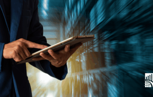 Business professional reviewing customer experience data on a tablet, representing how CX audits uncover hidden experience gaps and profit leaks for organizations.