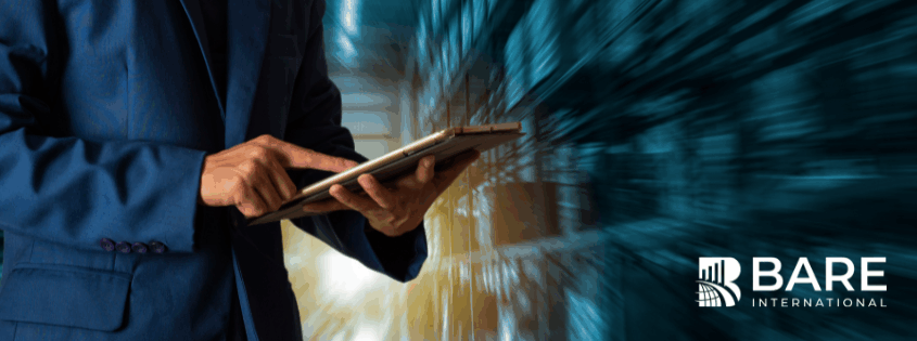 Business professional reviewing customer experience data on a tablet, representing how CX audits uncover hidden experience gaps and profit leaks for organizations.