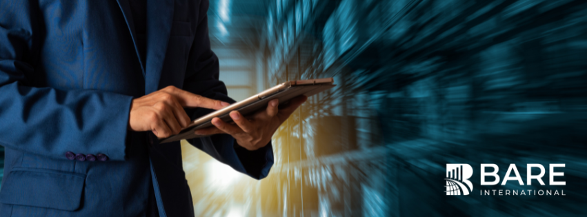 Business professional reviewing customer experience data on a tablet, representing how CX audits uncover hidden experience gaps and profit leaks for organizations.