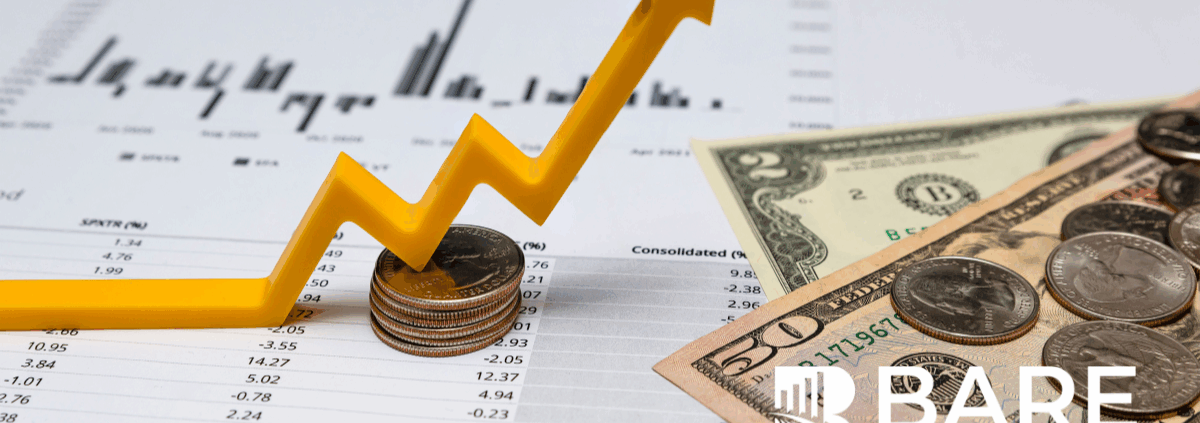 Yellow upward financial arrow on top of stacked coins with cash and performance charts, symbolizing revenue protection and the impact of mystery shopping on preventing CX-related profit leaks.