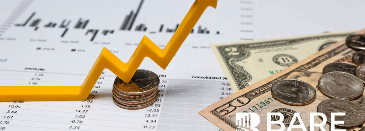 Yellow upward financial arrow on top of stacked coins with cash and performance charts, symbolizing revenue protection and the impact of mystery shopping on preventing CX-related profit leaks.